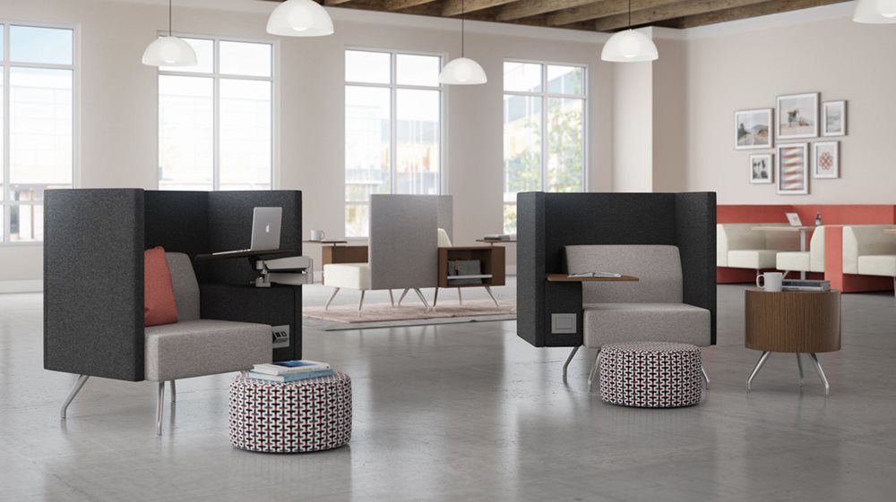 The Pairings collection by Kimball incorporates technology with comfortable seating, style, and privacy in a small space perfect for cohabitation workspaces.
