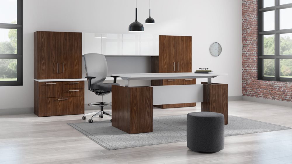 A height-adjustable desk allows employees to work standing or sitting for better health and improved ergonomics which leads to increased productivity.