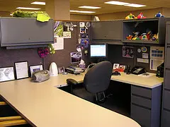 An office cubicle with all necessary furniture