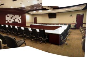 Large Wooden Conference room with additional seating